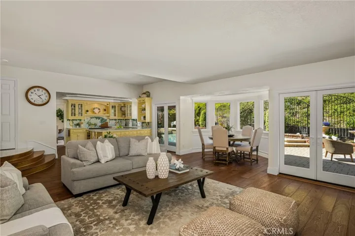 Family room/den area opens to both the kitchen and casual dining areas.