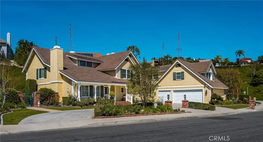 The over-sized 3 car garage has an ample amount of storage and opens to a circular driveway!