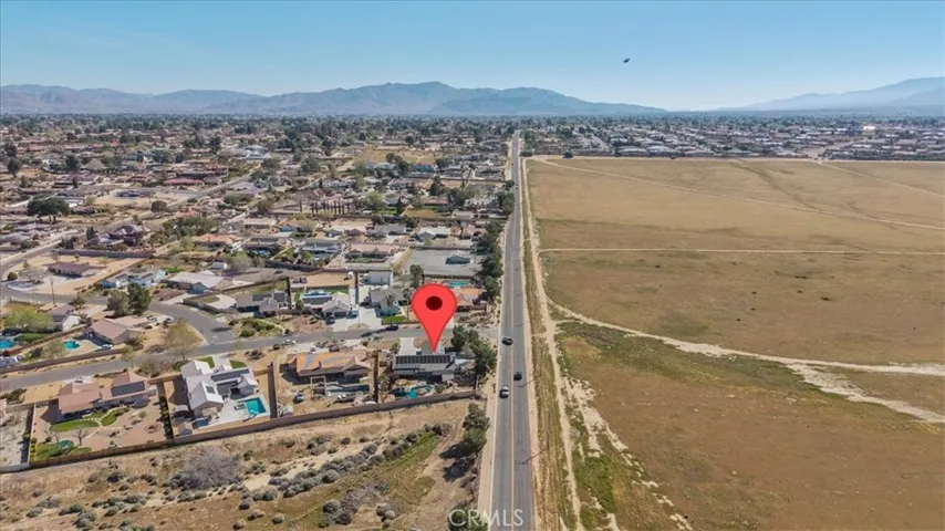Aerial view with subject property identified for reference