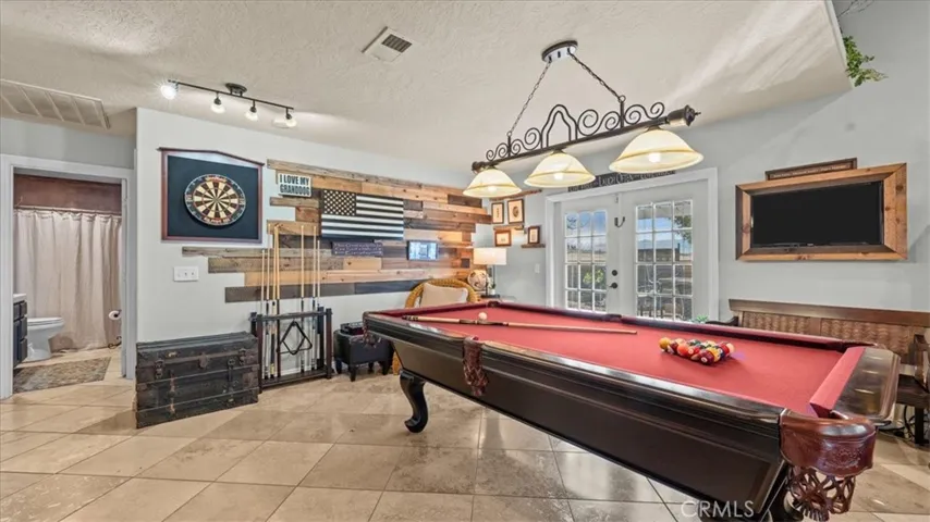 Flexible bonus space currently used as a game area with pool table