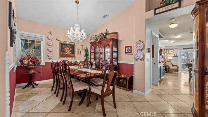 Dining room:Dedicated dining space with views of the front yard