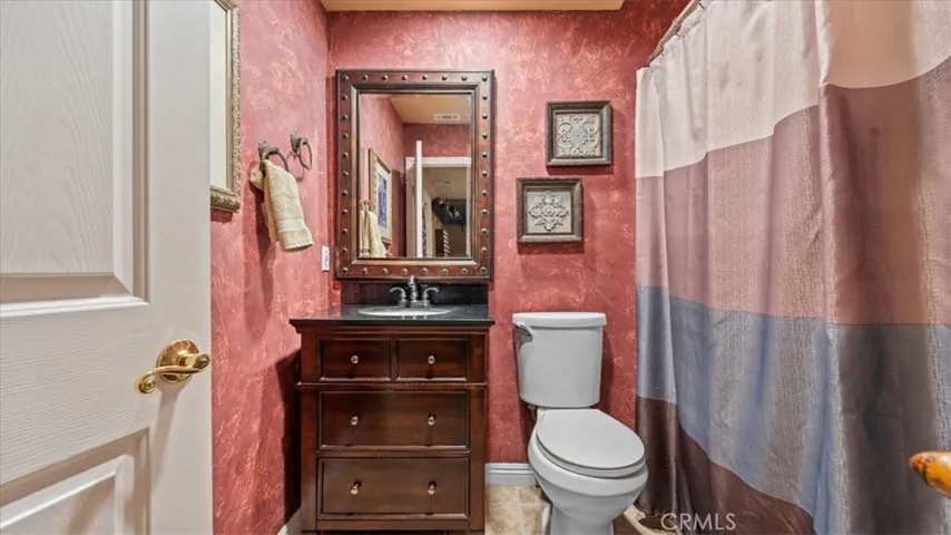 Third bathroom connected to separate-entry bedroom