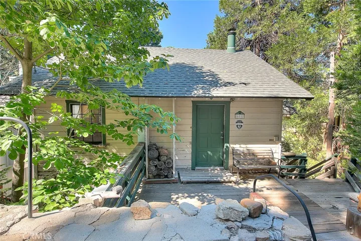 Front patio welcomes you to this property.
