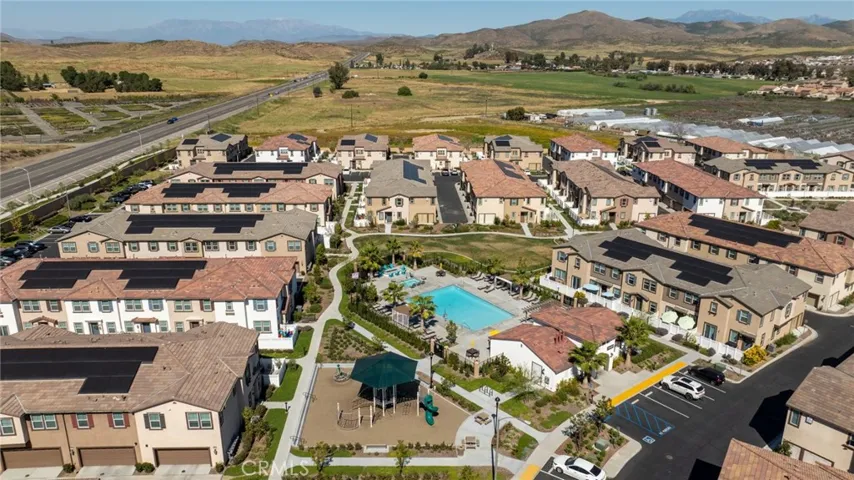 Clubhouse, BBQ areas, fire pit, cornhole, and park