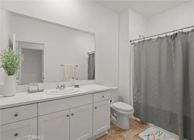 Upstairs full bathroom convenient for secondary bedrooms.