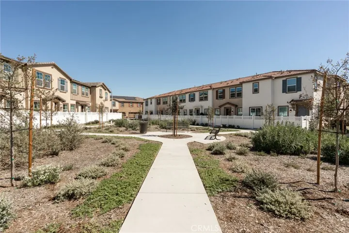 Open Courtyard Setting Added Space & Separation Between Units