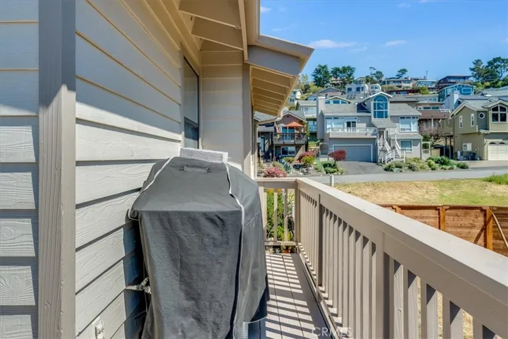 An alcove on the deck keeps the bbq hidden from view.