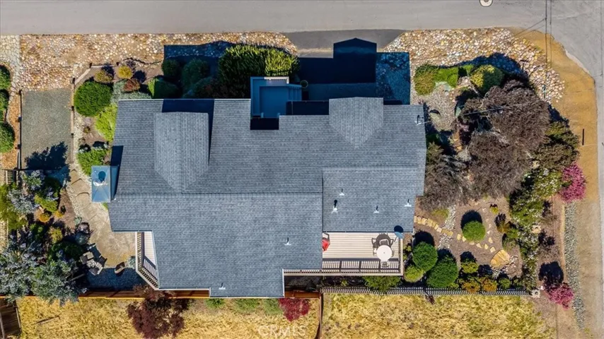 Notice the extra parking area on the left side of the photo. That is the west side of the home.