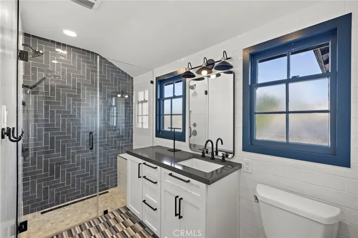 Updated hall bathroom with walk in shower