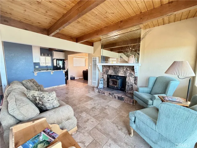 Living room with wood burning stove.