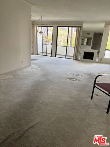 living room opening to balcony