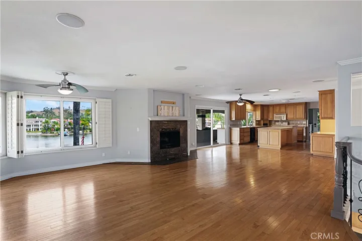 Family room with fireplace and lake view