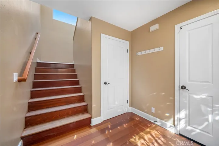 White door leads to lower level