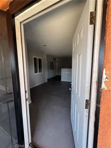 Front door opens to large entry with island