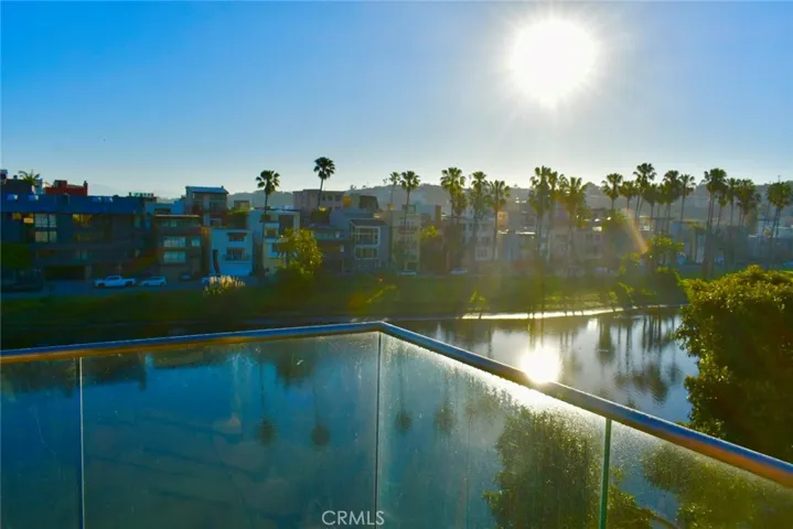 From the rear terrace, enjoy unobstructed views of the Del Rey Lagoon.
