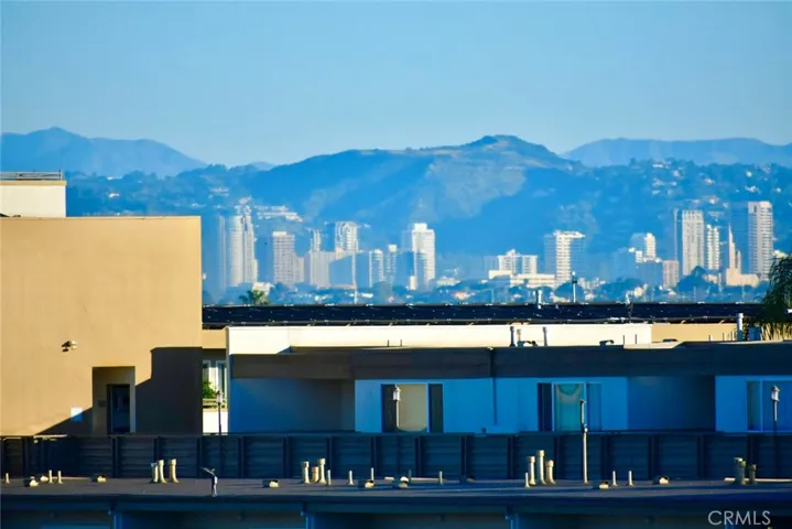 Panoramic views of Los Angeles and the Hollywood Hills.
