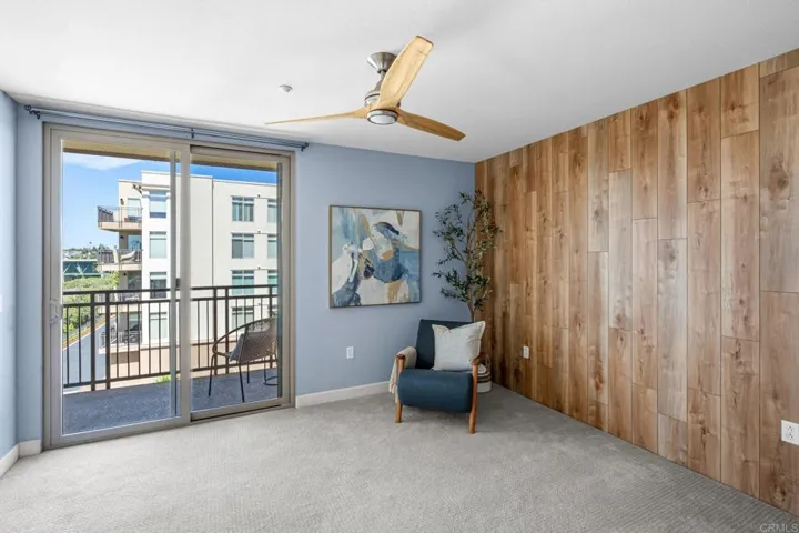 Guest bedroom with private balcony - pool view and