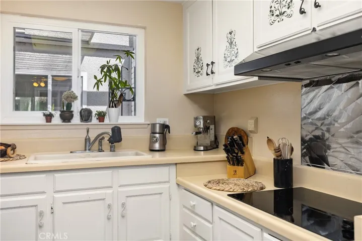 Modern hood over cooking range