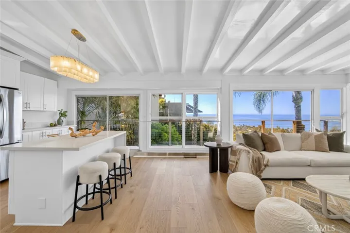 Open concept ocean view kitchen and living room