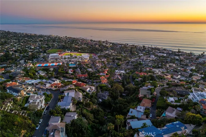 Close to the village, beach and high school