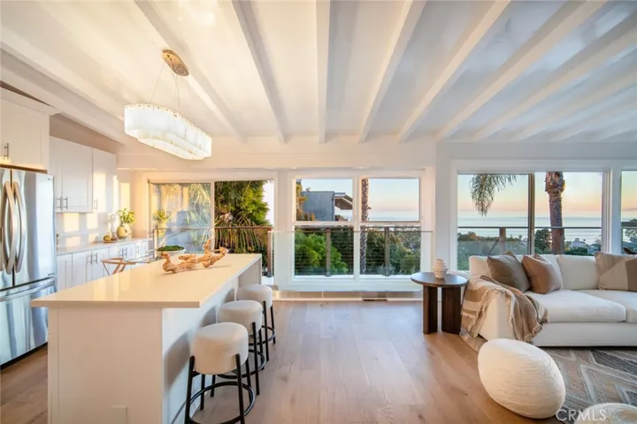 Open concept ocean view kitchen and living room