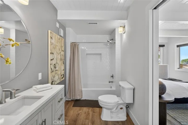 Downstairs bathroom with shower tub combo (one of two downstairs)