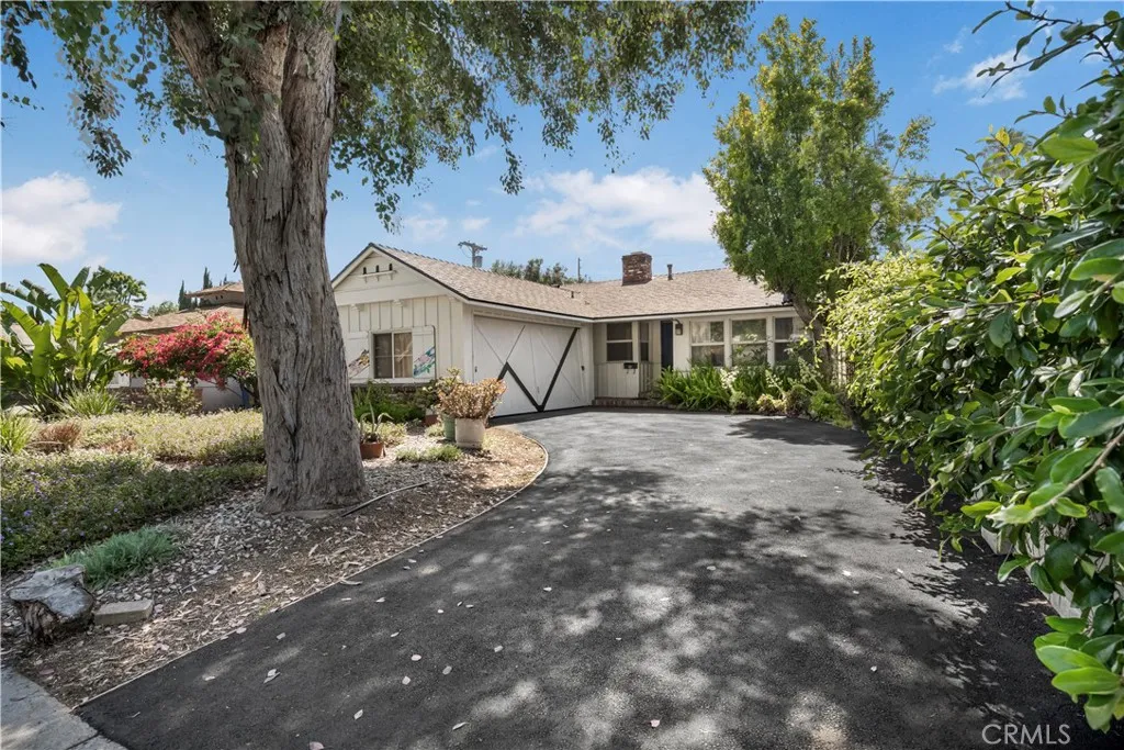 
Paved Driveway  and        Home view ASM5102