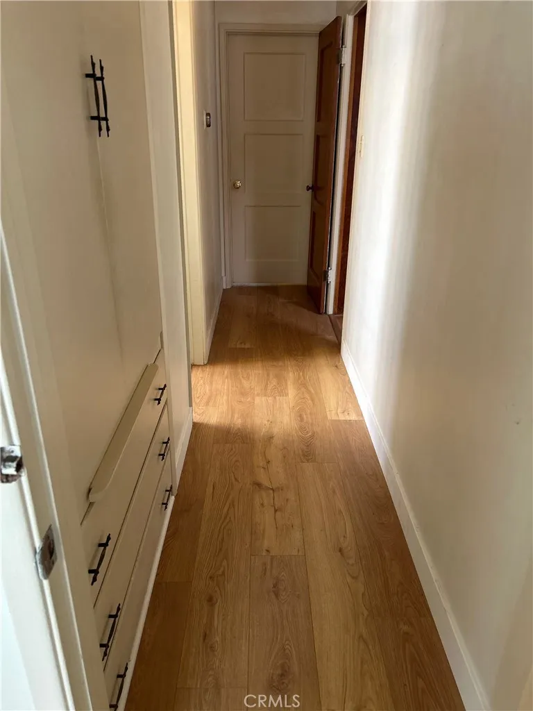 Hallway to Bedrooms  linen closet & Bath entry