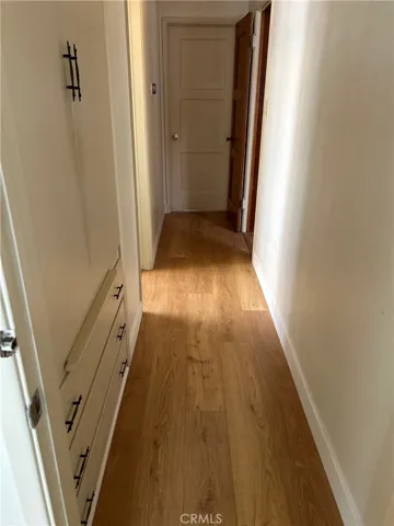 Hallway to Bedrooms  linen closet & Bath entry