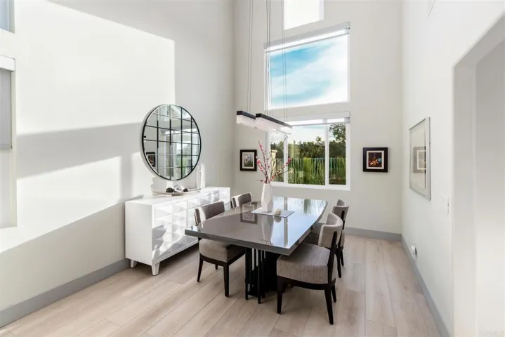 Dinning room faces backyard & enjoys beautiful sunsets. 19 Milgard windows with UV done in 2022.