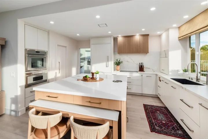 Kitchen faces backyard and beautiful sunset views