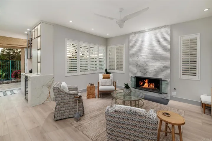 Gas fireplace and dramatic lighting add to the relaxing environment