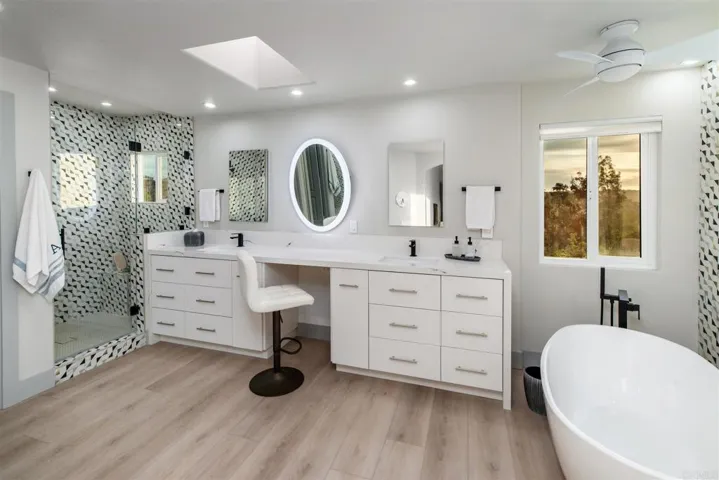 Main bathroom has separate tub & shower