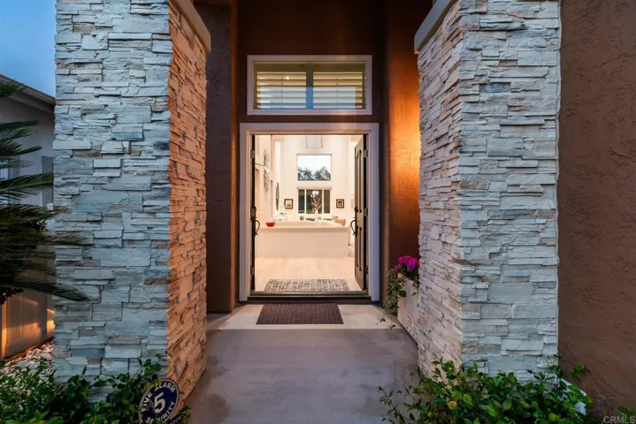 House opens to soaring two story ceilings