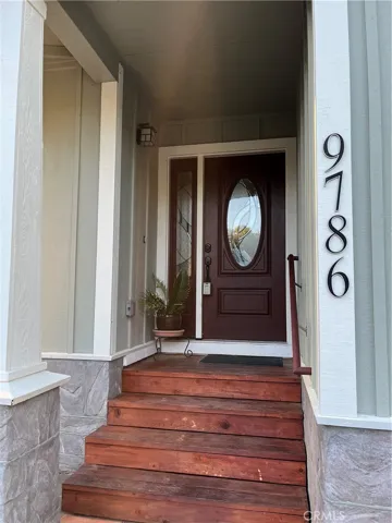 Refinished front steps, rear deck