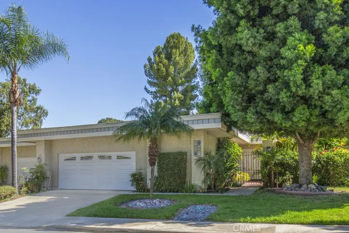 Welcome to 5544-B Rayo Del Sol - an elegant remodeled three-bedroom, two-bath, single-level CASA LORENZO residence in the Laguna Woods senior community. Boasting over 2200 sq. ft. of living space, this property is located on a single-loaded street in the prestigious "110" neighborhood. The landscaping is maintained by the Mutual. In addition to the oversized two-car garage, the driveway can accommodate two additional vehicles.