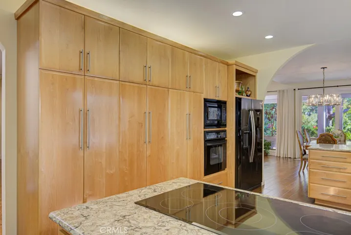 Ample kitchen storage. Cabinets feature convenient pull-out drawers.