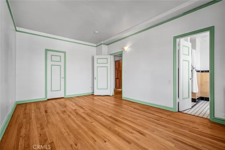 Spacious bedroom with ensuite bathroom.