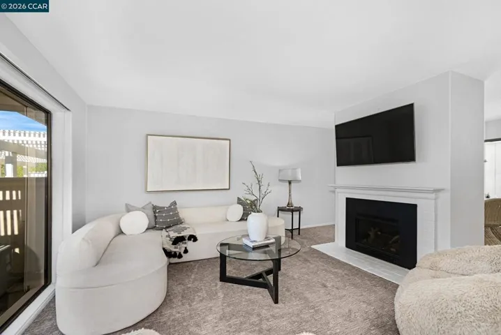 Living room with gas starter fireplace