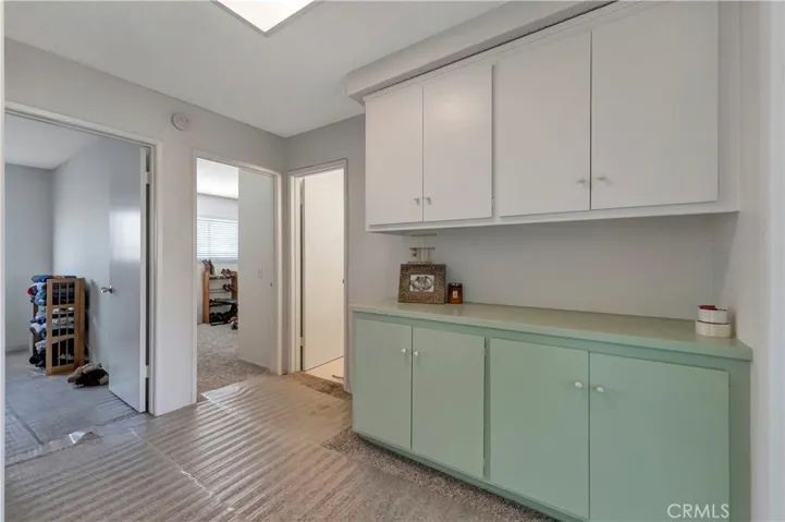 Upstairs landing area with linen closet.