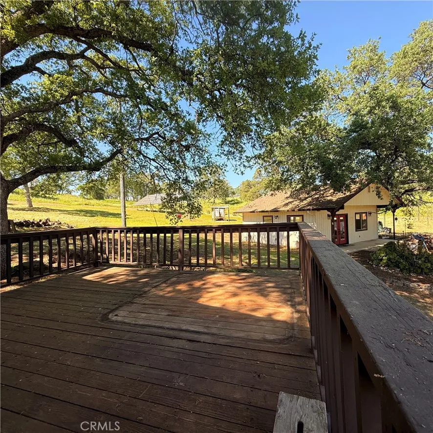 Large deck off the side of the house.