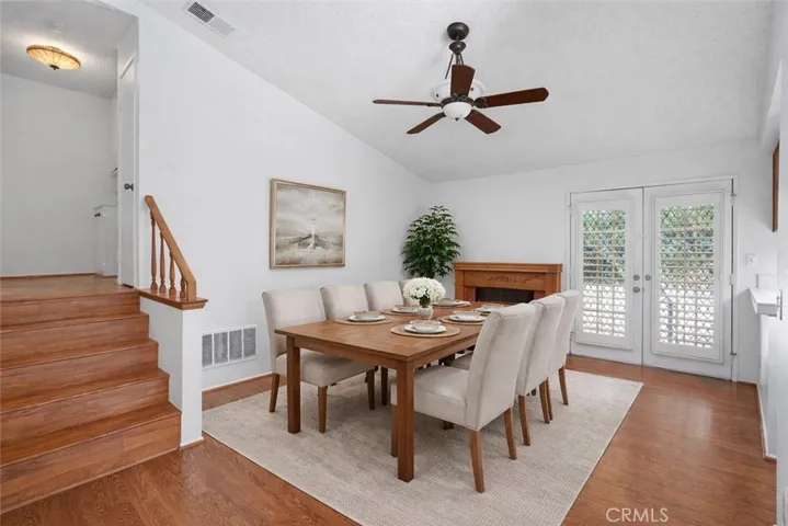 Dining room/family room with image altered digitally created.
