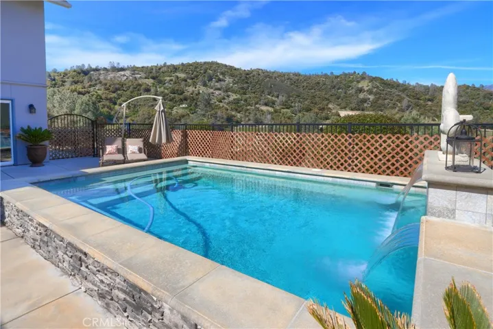 sit on the ledge and dangle your feet or sit in the pool on the wrap around ledge