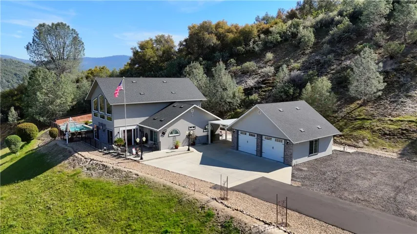 Carport and two car garage at home location