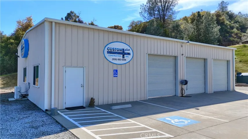 2 offices, 3 bays water dryer hookups bathroom w/shower mini split & built in cabinetry