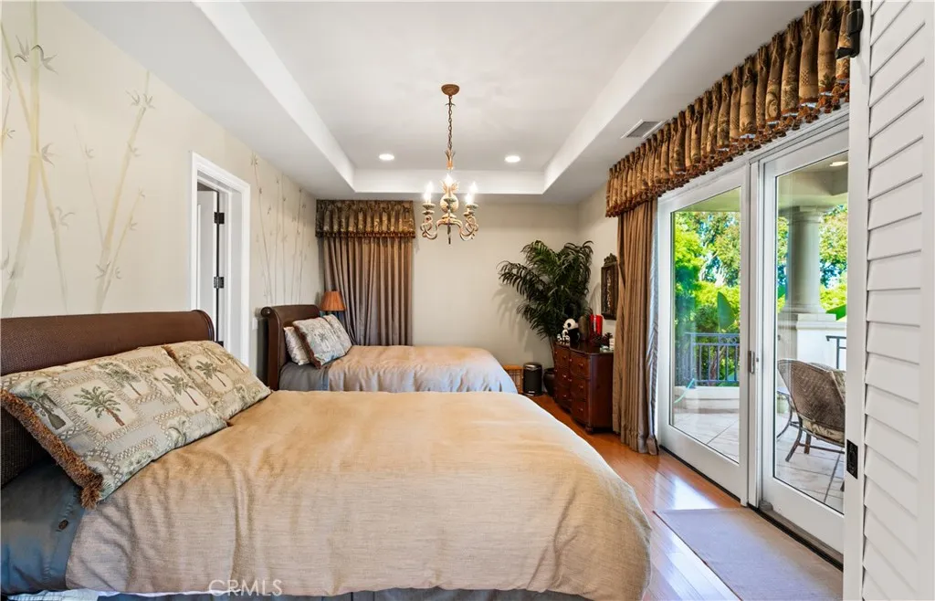 ADU Bedroom with patio overlooking the pool