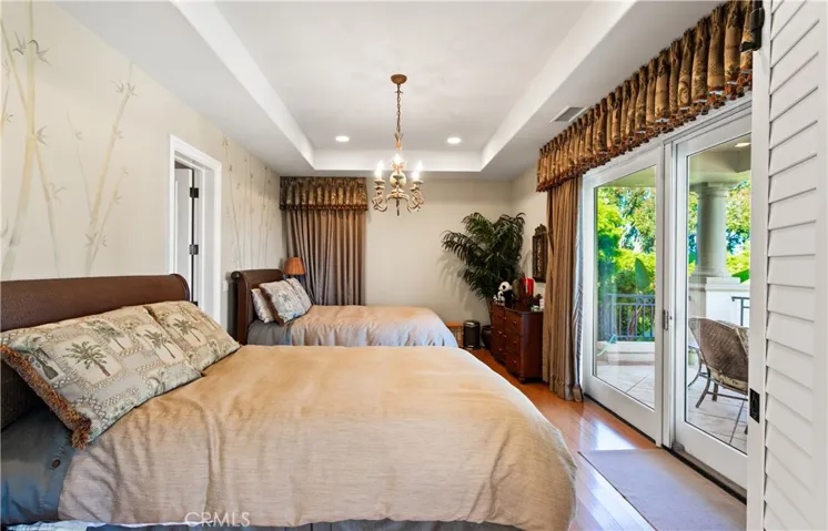 ADU Bedroom with patio overlooking the pool