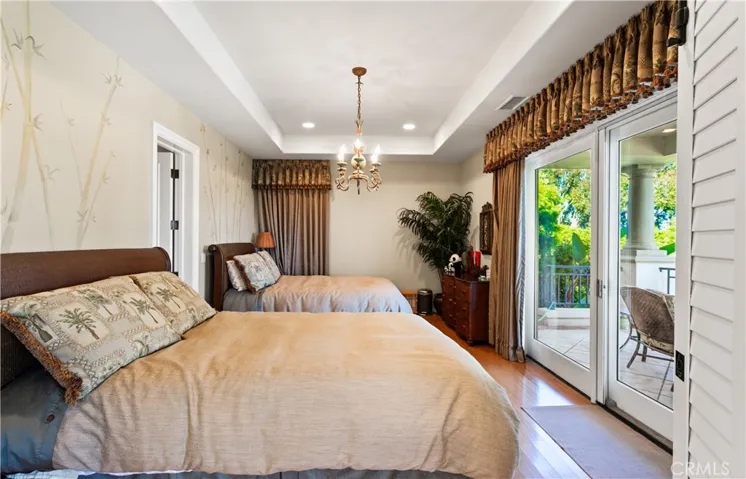 ADU Bedroom with patio overlooking the pool