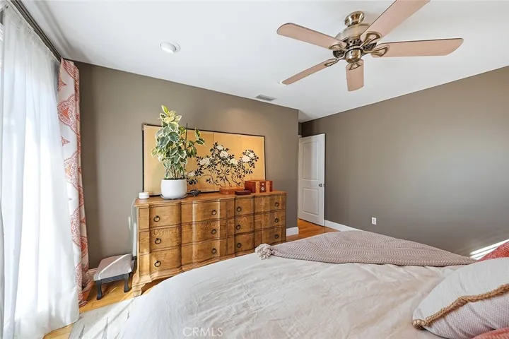 Primary bedroom with walk-in closet