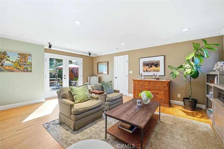 Glass-paned French doors with a great backyard view